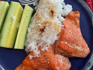 image maple syrup glazed salmon, rice and cucumbers